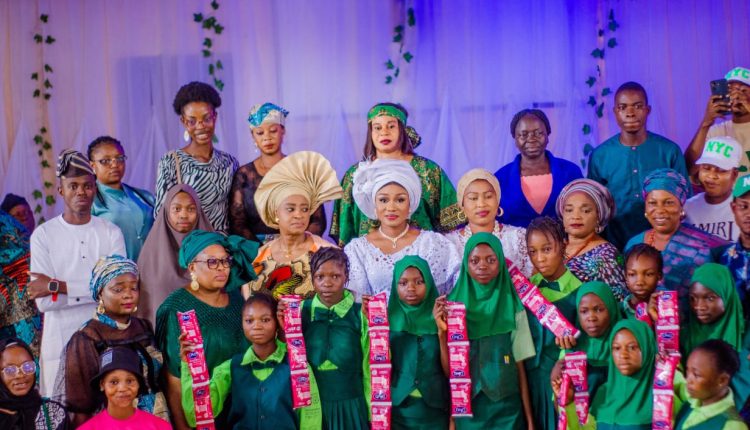 Osun First Lady, Deputy Speaker's Wife Partners NYC, Gifts Sanitary Pad to Over 300 Female Students in Ife North.